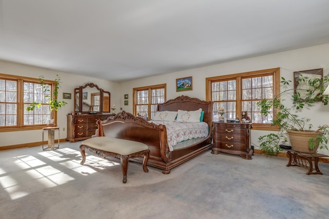 bedroom with light colored carpet