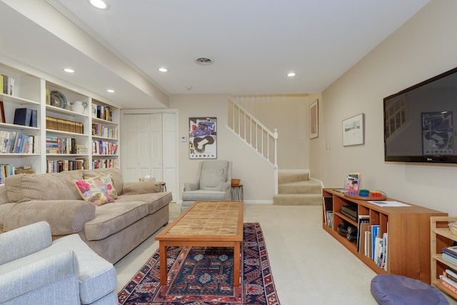 living room with light colored carpet