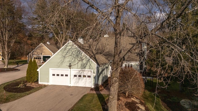 view of home's exterior with a garage