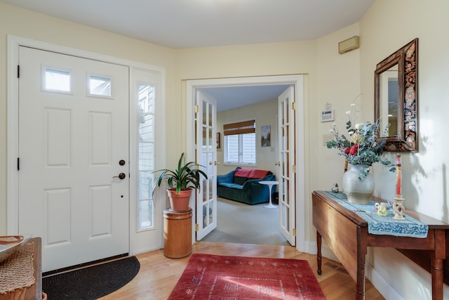 entrance foyer with light hardwood / wood-style floors