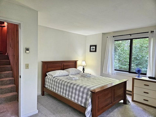 bedroom with light carpet