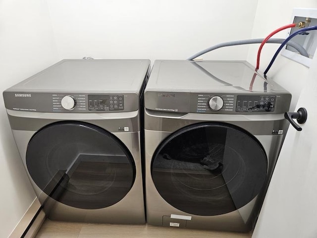 laundry room featuring washer and dryer