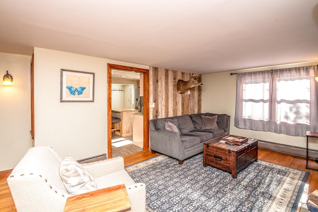 living room featuring hardwood / wood-style flooring and a baseboard radiator