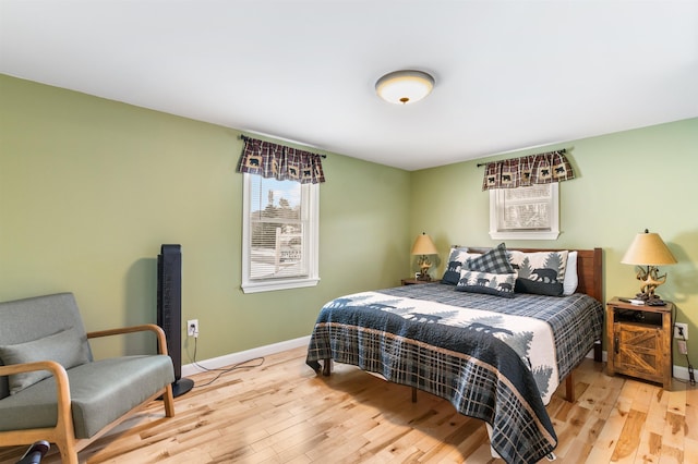 bedroom featuring light wood-type flooring