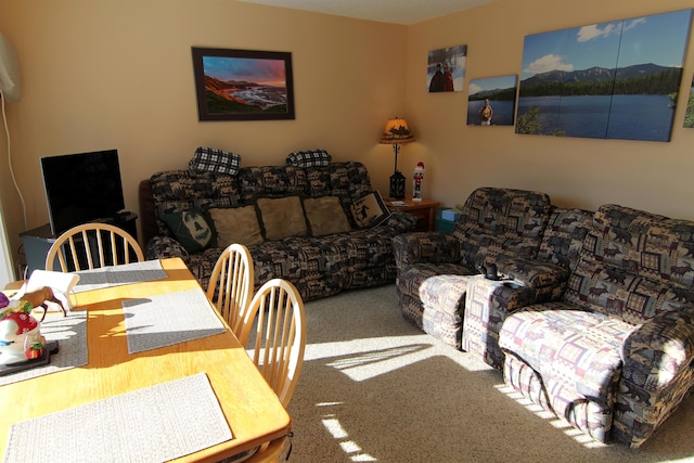 view of carpeted dining area