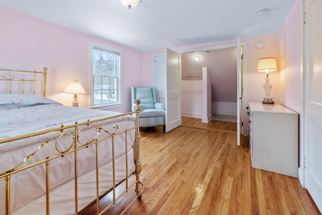 bedroom featuring light hardwood / wood-style floors