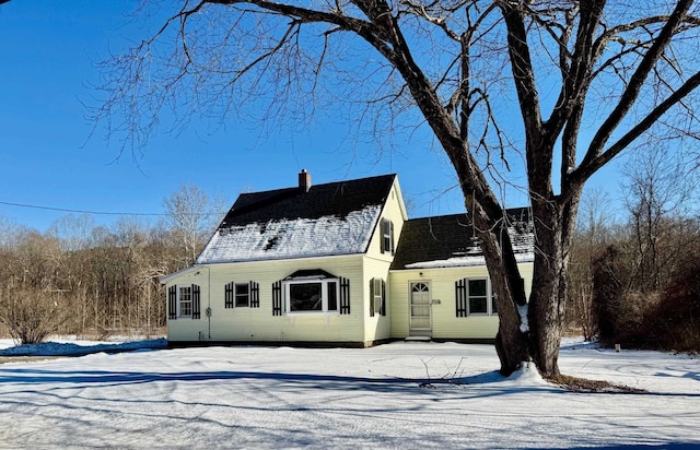 view of new england style home