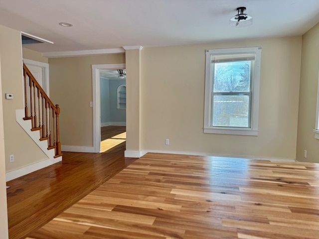 spare room featuring light hardwood / wood-style floors