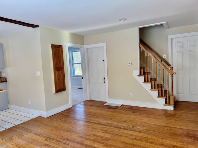 unfurnished living room featuring light hardwood / wood-style floors