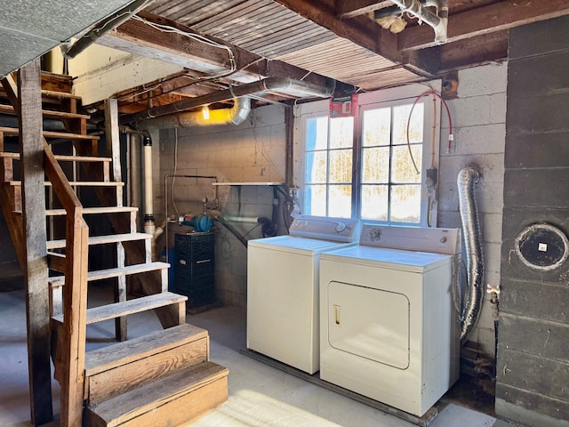 washroom featuring washer and dryer