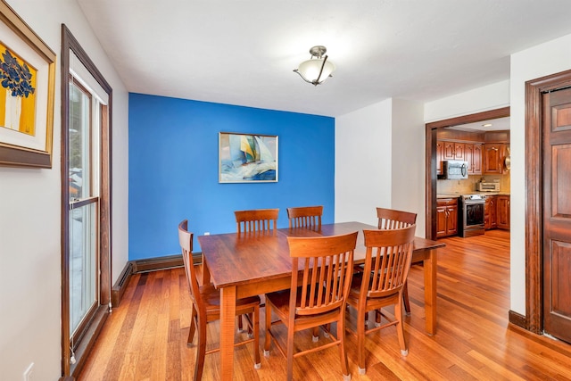 dining area featuring light hardwood / wood-style flooring