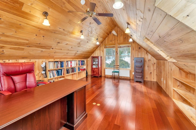 unfurnished office featuring lofted ceiling, wood ceiling, wood walls, ceiling fan, and hardwood / wood-style floors