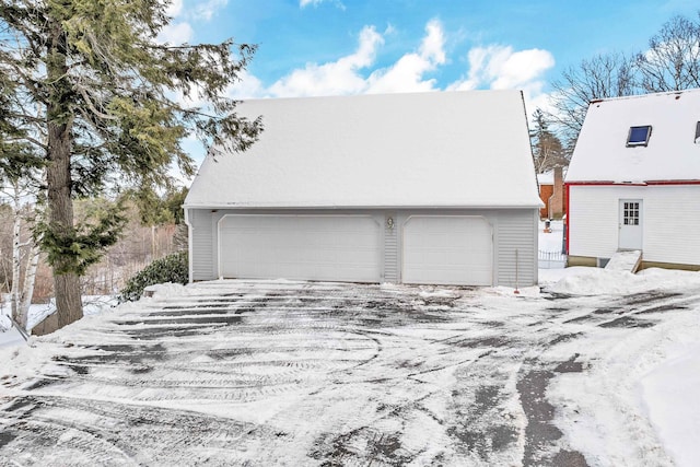 view of snow covered garage