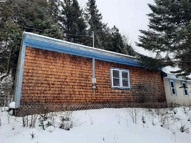 view of snow covered property