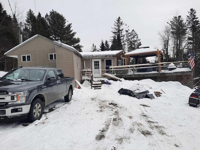 view of front of property featuring a gazebo