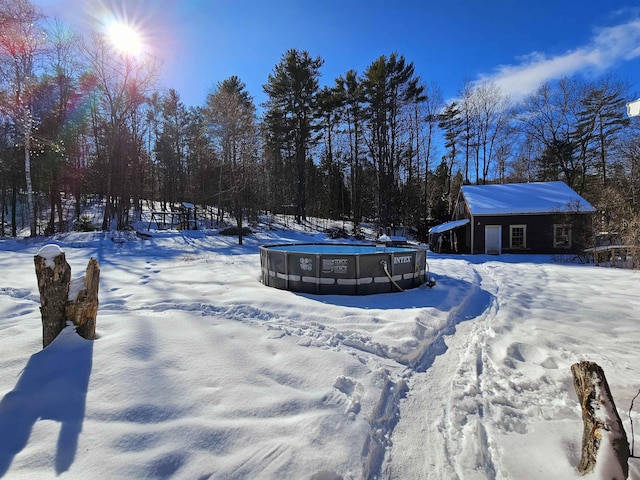 view of yard layered in snow