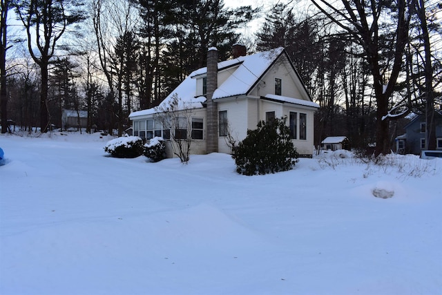 view of snow covered property