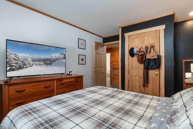 bedroom featuring crown molding