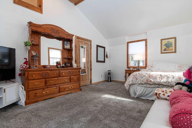 carpeted bedroom with lofted ceiling