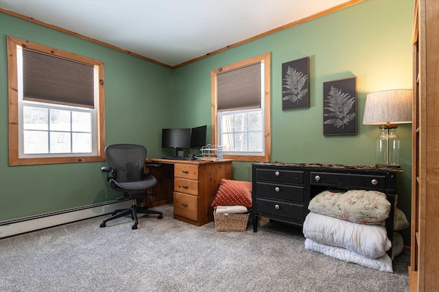 office area with a baseboard heating unit, ornamental molding, and carpet flooring