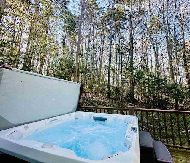 exterior details featuring a hot tub