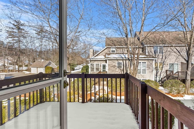 view of snow covered deck