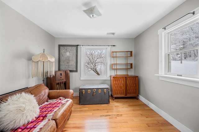 sitting room with light hardwood / wood-style floors