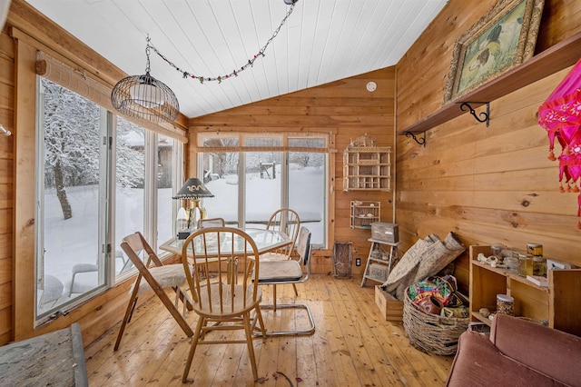 sunroom / solarium with vaulted ceiling and wood ceiling