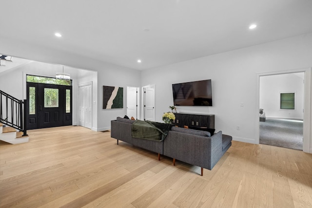 living room with light hardwood / wood-style floors