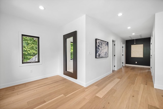 hallway featuring light wood-type flooring