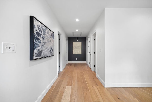 hall featuring light hardwood / wood-style floors