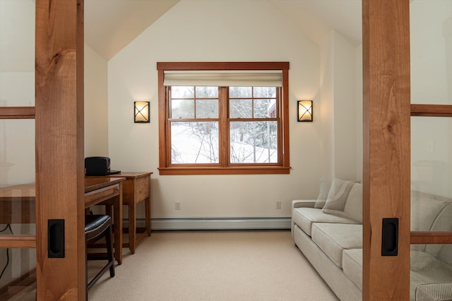 office featuring carpet flooring, vaulted ceiling, and a baseboard heating unit