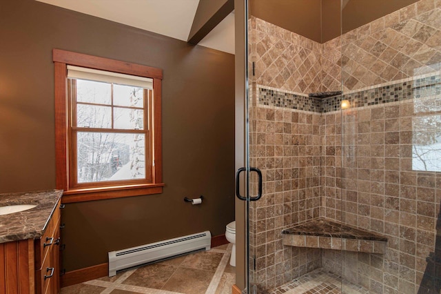 bathroom with baseboard heating, vanity, toilet, and an enclosed shower