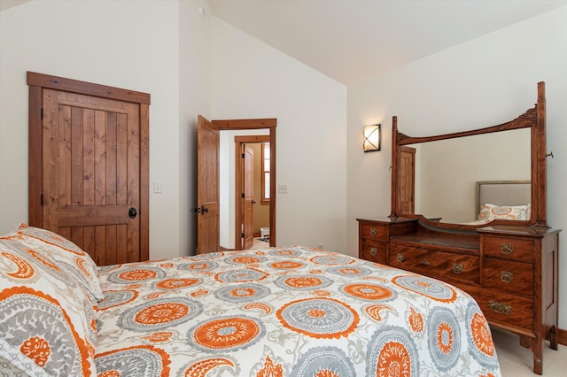 bedroom featuring high vaulted ceiling and carpet floors