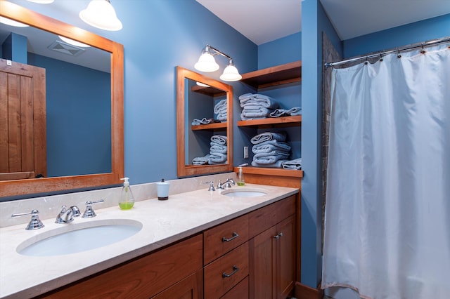 bathroom with vanity and a shower with shower curtain