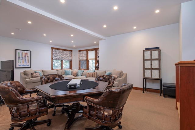 dining space featuring light colored carpet