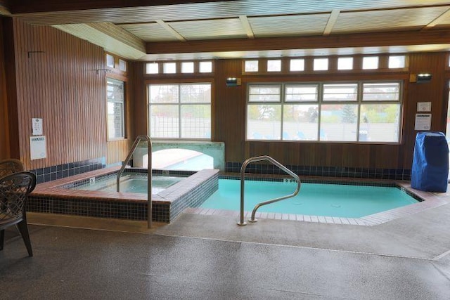 view of pool with an indoor in ground hot tub