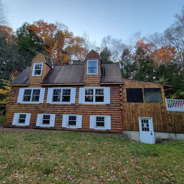 exterior space with a front lawn