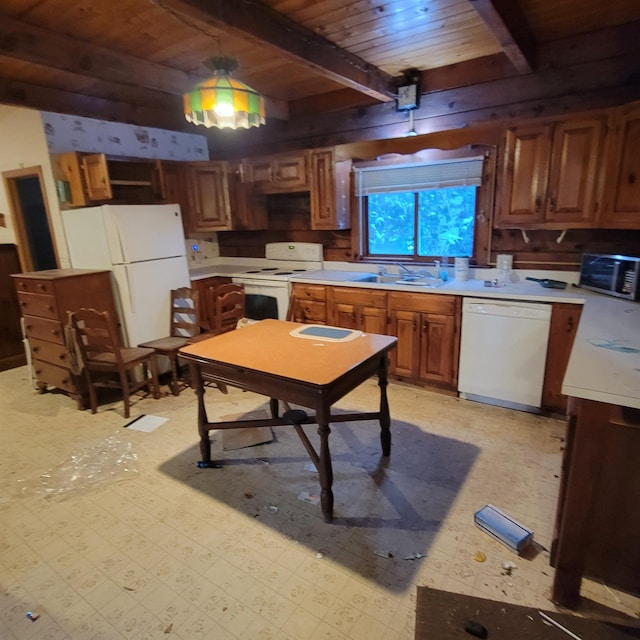 kitchen featuring beamed ceiling, sink, wood ceiling, and white appliances