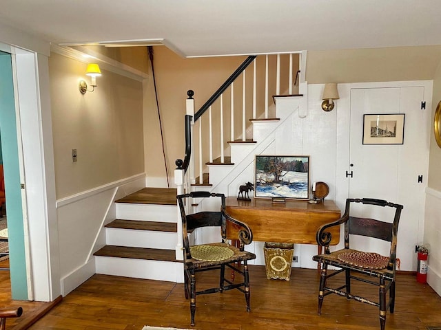 stairs with hardwood / wood-style flooring