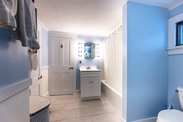 full bathroom featuring vanity, toilet, and shower / tub combo