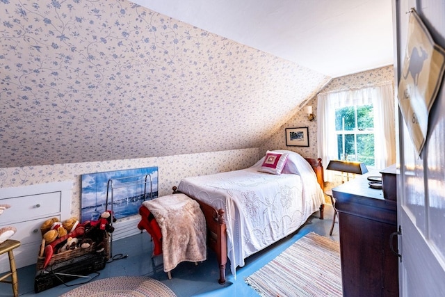 bedroom featuring lofted ceiling