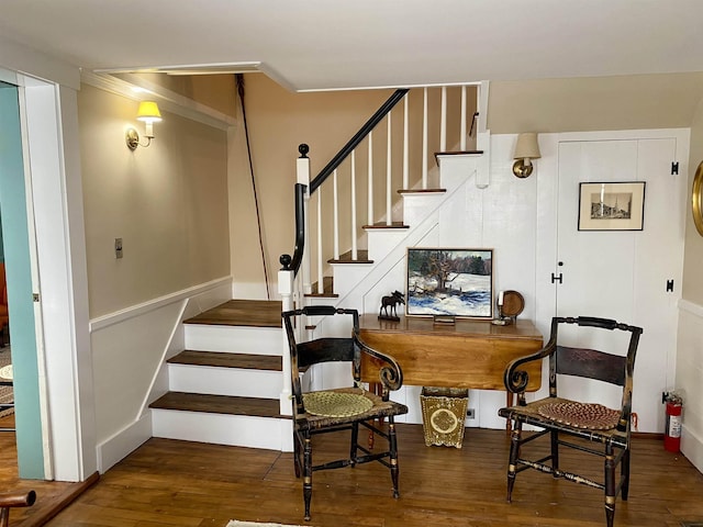 stairway featuring hardwood / wood-style flooring