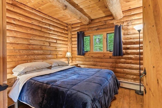 bedroom featuring wood ceiling, rustic walls, baseboard heating, wood-type flooring, and beamed ceiling