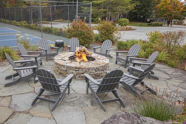 view of patio / terrace with an outdoor fire pit