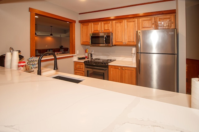 kitchen featuring appliances with stainless steel finishes and sink