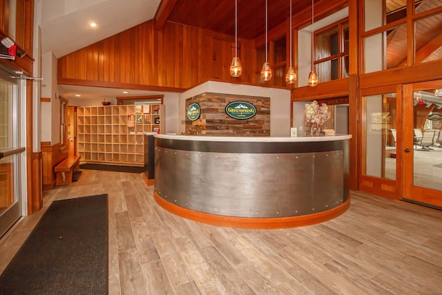 reception area featuring french doors and indoor bar