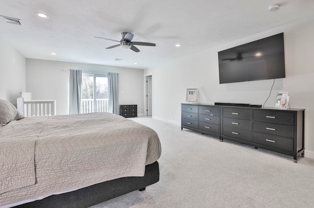 bedroom with light carpet and ceiling fan