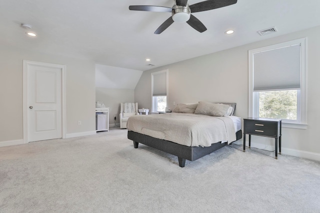 carpeted bedroom with lofted ceiling and ceiling fan