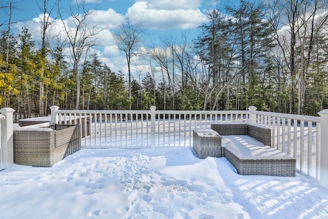 view of snow covered deck